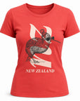 A red short-sleeve crewneck t-shirt featuring a graphic of a kiwi bird wearing sunglasses over a large white stylized 'N' and the text 'NEW ZEALAND' below.