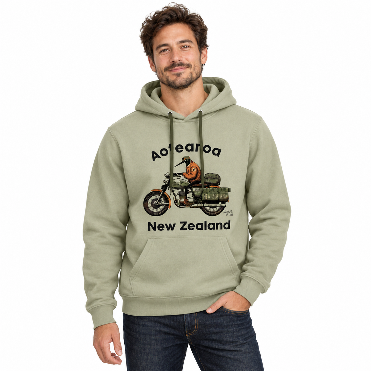 Man wearing a light grey hoodie with a graphic design on a plain background