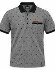 A short-sleeve polo shirt with a gray and black micro-pattern, featuring a solid black collar, black cuffs, and a black chest pocket with a small orange and black label.