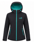 A women's black softshell hooded jacket with a bright teal interior hood lining, teal zipper, and teal logo on the left chest, shown against a plain white background.