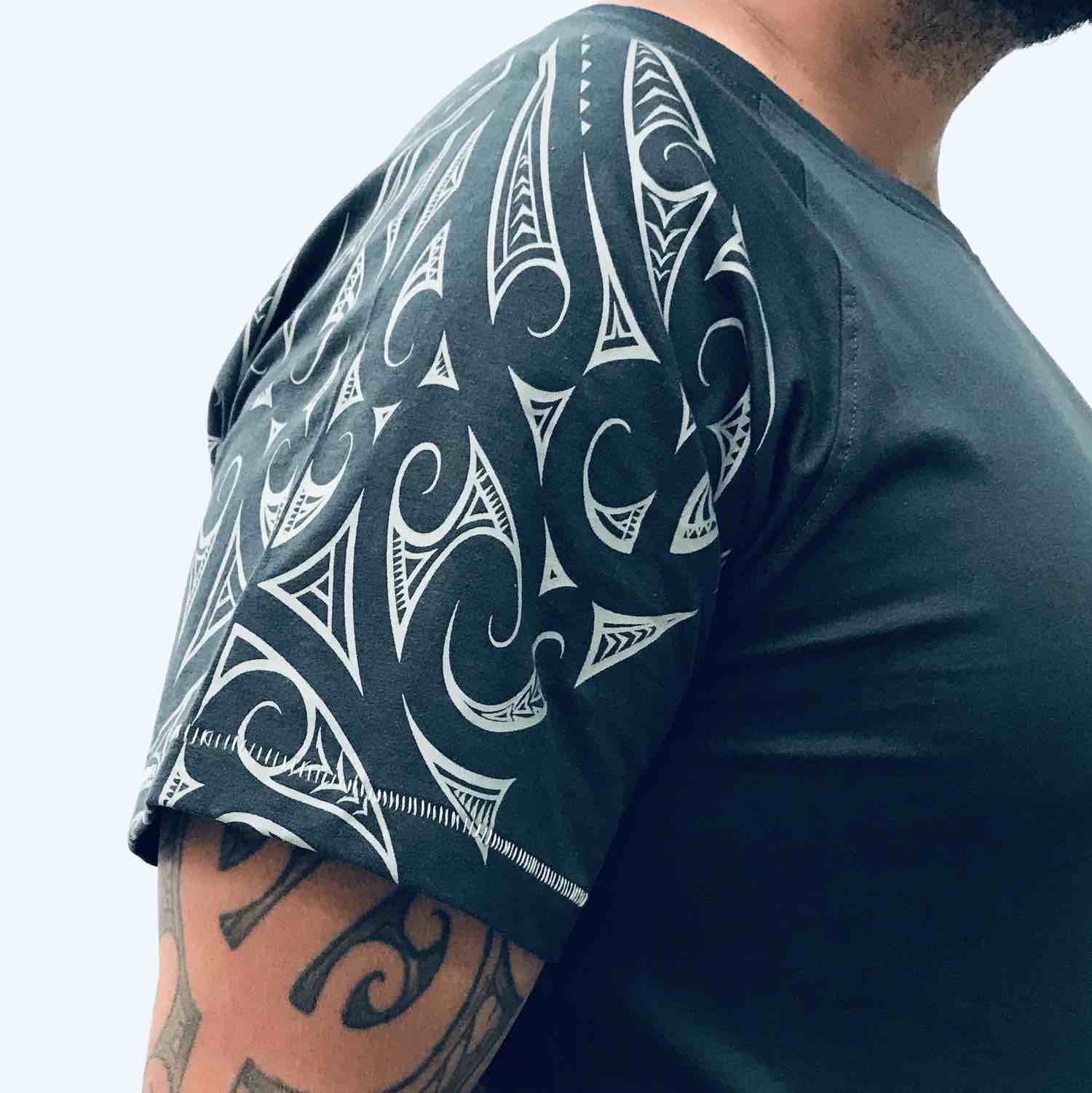 men's teal raglan sleeve new zealand t-shirt wth maori design shoulder print - kia-kaha nz